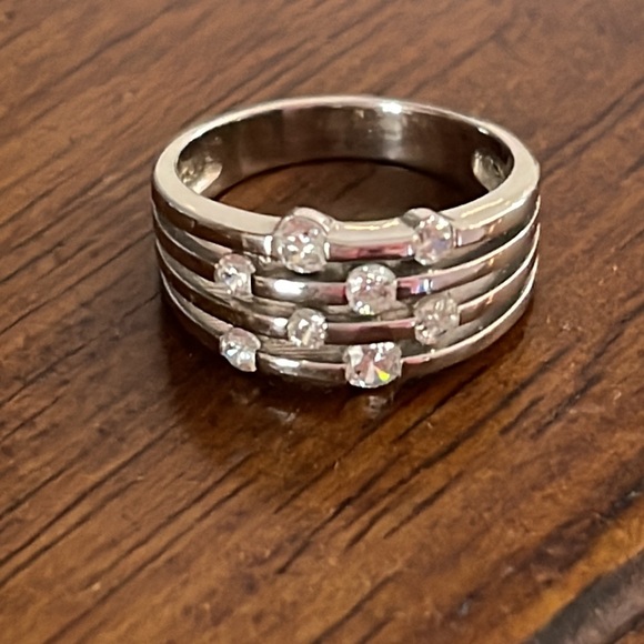 Diamonique Jewelry - 925 Sterling silver ring with clusters Diamonique. Stamped 925 Sterling Silver